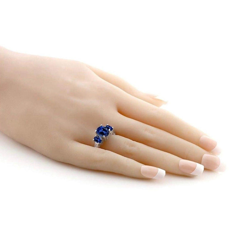 Oval Cut Tri Stone Blue Topaz Ring - Assorted Sizes Jewelry - DailySale