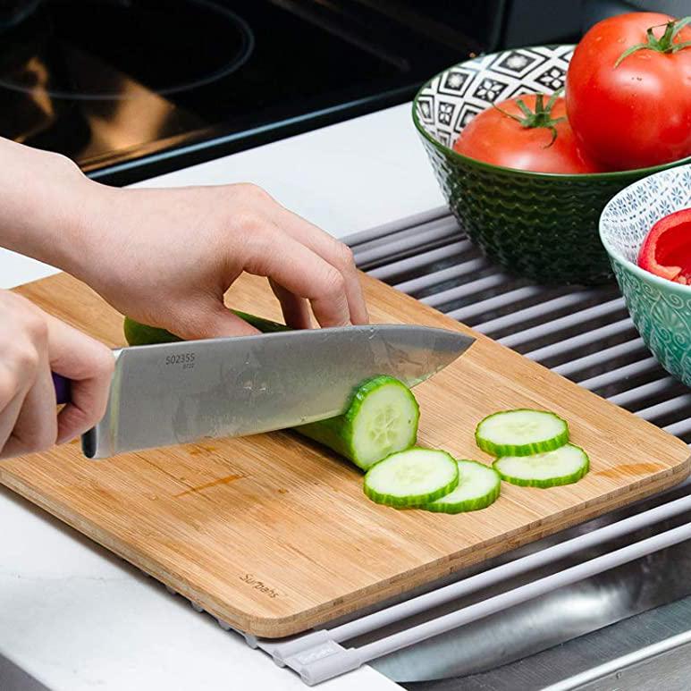 https://dailysale.com/cdn/shop/products/surpahs-over-the-sink-multipurpose-roll-up-dish-drying-rack-kitchen-dining-dailysale-391482.jpg?v=1620429437