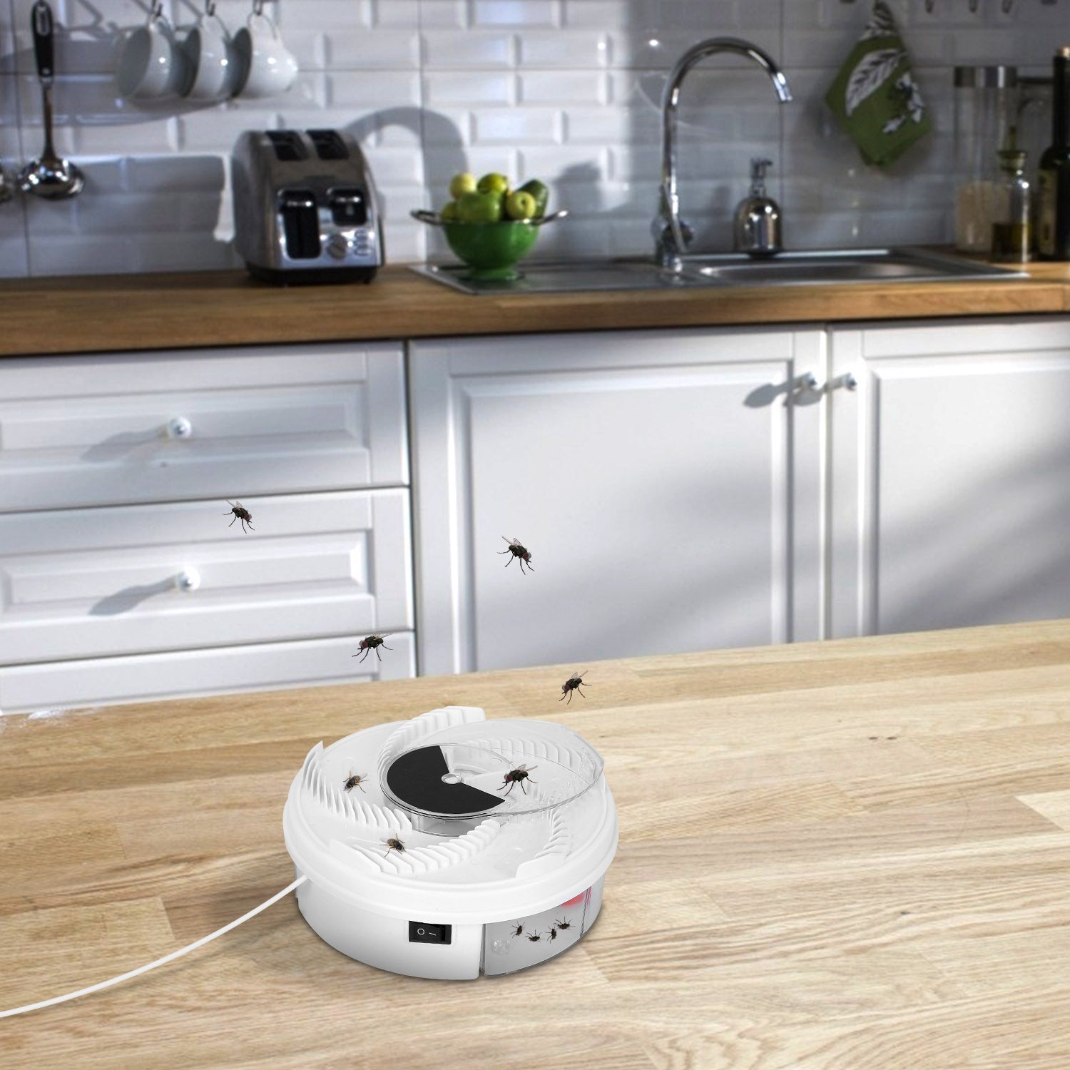 USB powered Electric Fly Trap Automatic Flycatcher in action placed on  kitchen island with flies flying around it