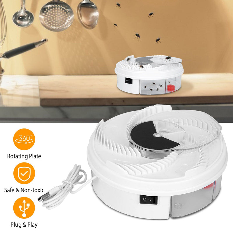 Top angled view of a USB powered Electric Fly Trap Automatic Flycatcher, with a background showing the device placed on a kitchen counter with the following inscriptions: Rotating Plate, Safe & Non-Toxic, Plug & Play