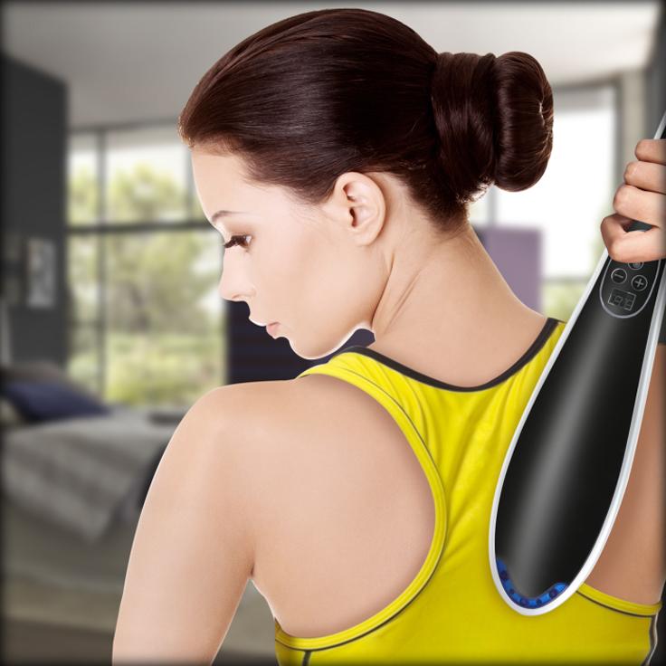 Woman using a VivaSpa Handheld Multi-Node Percussion Body Massager to massage her uppoer back
