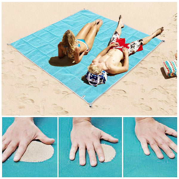 Man and woman lying on a Waterproof Sand Free Beach Mat on the beach