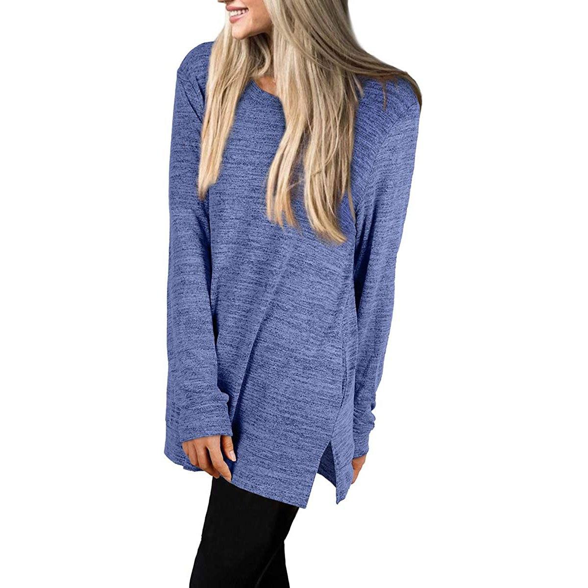 #color_blueaLateral view of a woman with her hands on her side wearing a Women's Sleeve Oversized Casual Sweatshirts in blue