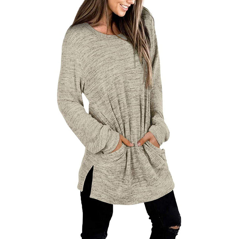 3/4 front view of a smiling woman with her hands in her pockets wearing a Women's Sleeve Oversized Casual Sweatshirts in khaki