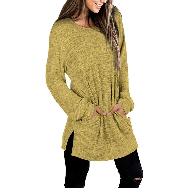 3/4 front view of a smiling woman with her hands in her pockets wearing a Women's Sleeve Oversized Casual Sweatshirts in yellow