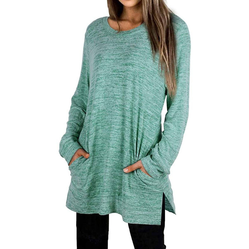 Woman with both her hands in her pockets wearing a Women's Sleeve Oversized Casual Sweatshirts in green