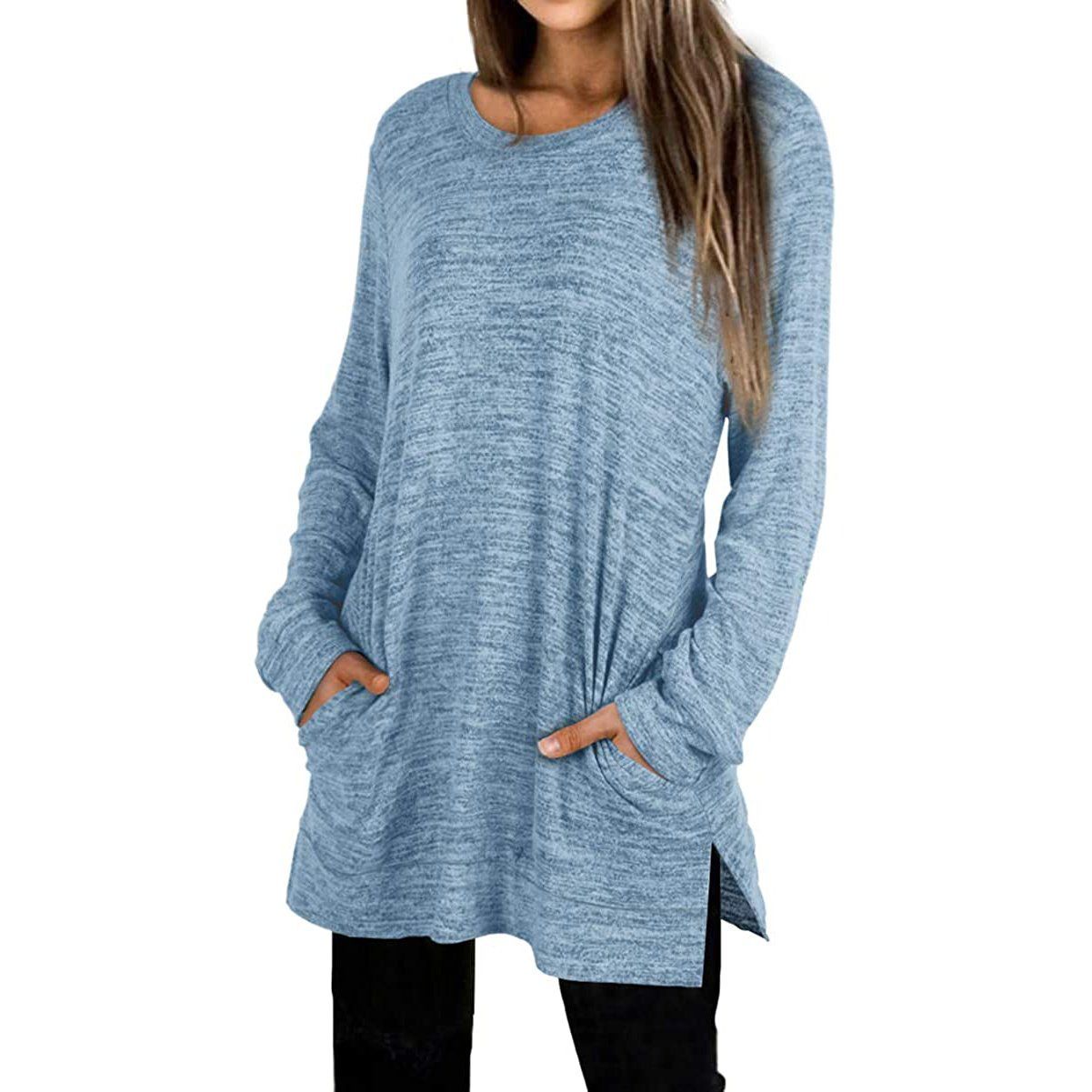 Woman with both her hands in her pockets wearing a Women's Sleeve Oversized Casual Sweatshirts in blue