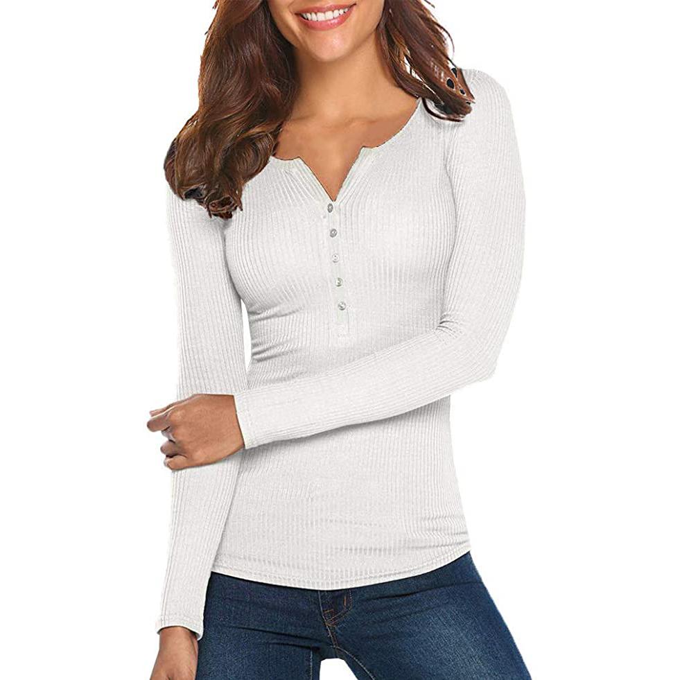 Smiling woman with her left arm over the right arm wearing a Long Sleeve V Neck Ribbed Button Down Knit Sweater Fitted Top in white, available at Dailysale