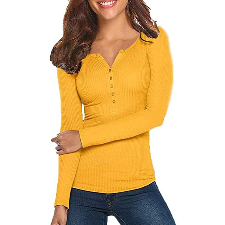 Smiling woman with her left arm over the right arm wearing a Long Sleeve V Neck Ribbed Button Down Knit Sweater Fitted Top in yellow, available at Dailysale