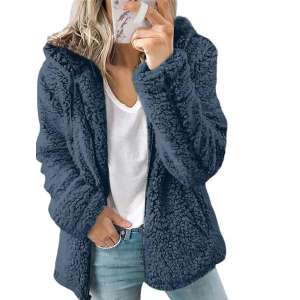 Women holding a smartphone wearing a blue Plus Size Hoodie Coat Long Sleeve, available at Dailysale
