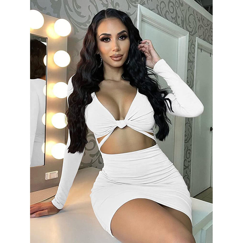 Women resting on a vanity, wearing a white Sexy Bodycon Deep V Neck Long Sleeve Cut Out Club Mini Dress