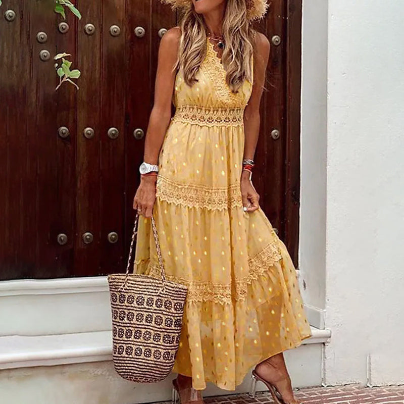 Woman holding a purse with one hand wearing a Sleeveless Solid Color Lace Panel Dress in yellow